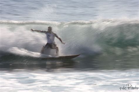 Surfing in Honolii Beach Hilo Hawaii USA