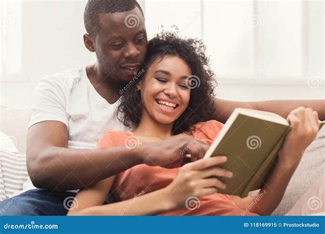 Happy Black Couple Reading Together At Home Stock Image Image Of