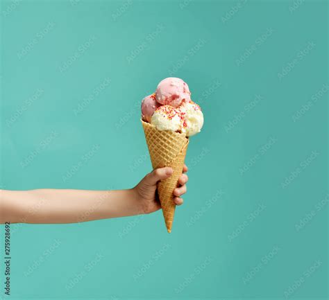 Baby Kid Hand Holding Big Ice Cream In Waffles Cone On Blue Stock Photo