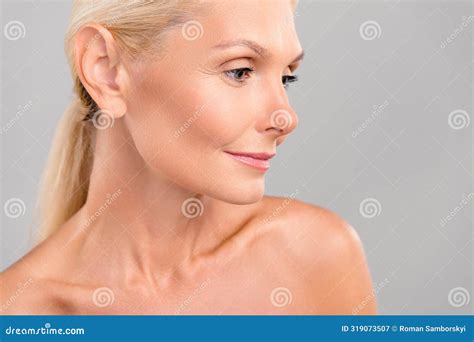 Photo Of Sweet Adorable Senior Lady Nude Shoulders Looking Empty Space