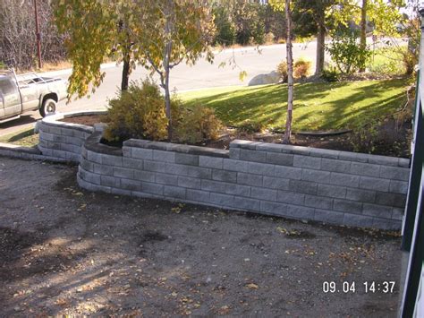 Allan Block Wall Creates Space For Driveway Jats Backyard Landscaping