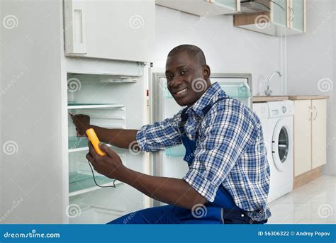 Technician Repairing Refrigerator Appliance Stock Photo Image 56306322