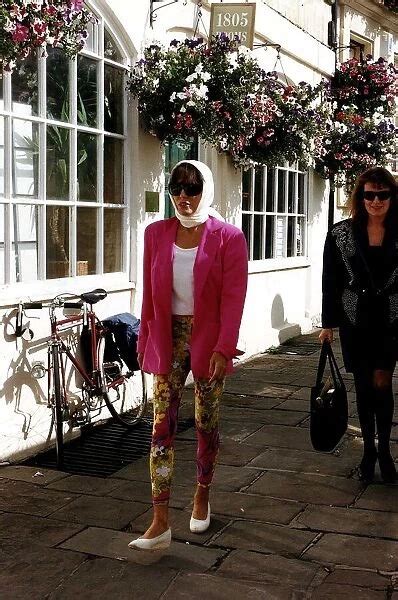 Joan Collins Actress Walking In Street Dbase A©mirrorpix