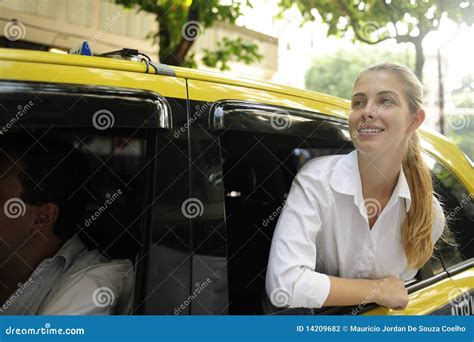 Happy Female Passenger Inside Of A Taxi Stock Photography Image 14209682