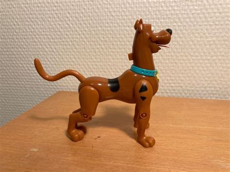 Se produkter som liknar Scooby Doo Scooby Action Figu på Tradera