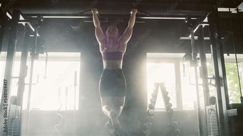 Contre Jour Aesthetic Shot A Strong Woman Training With Pullups