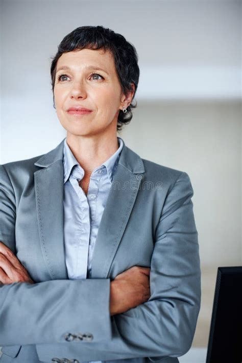 Business Woman Thinking In Office Successful Mature Business Woman