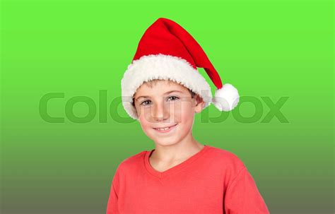 Adorable child with Santa Hat | Stock image | Colourbox