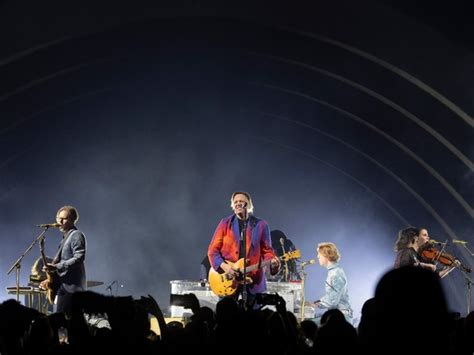 Review Arcade Fire Dazzles At Bell Centre But Questions Remain