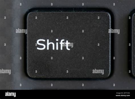 Shift key on a laptop keyboard Stock Photo - Alamy