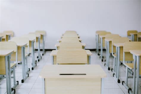 Premium Photo Student Desks And Chairs Are Arranged Neatly In The