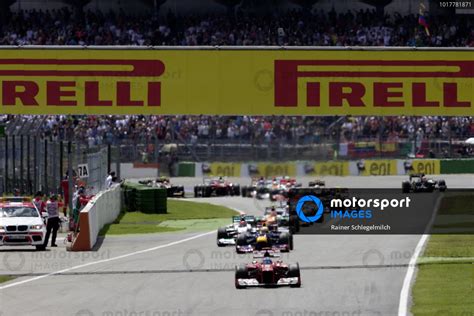 Fernando Alonso Ferrari F Leads Sebastian Vettel Red Bull Rb