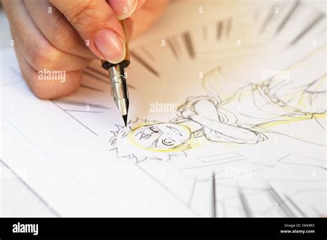 Japanese Manga artist working in the studio Stock Photo - Alamy