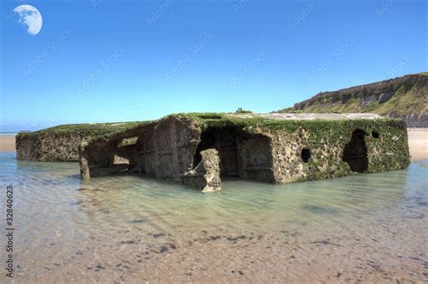 Arromanches Le Port Artificiel Et Ses Caissons Phoenix Stock Photo