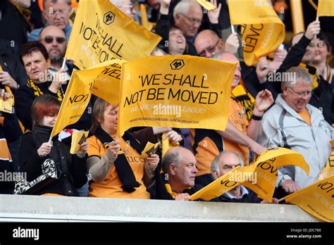 WOLVES FANS WAVE FLAGS WOLVERHAMPTON WANDERERS FC MOLINEUX STADIUM ...