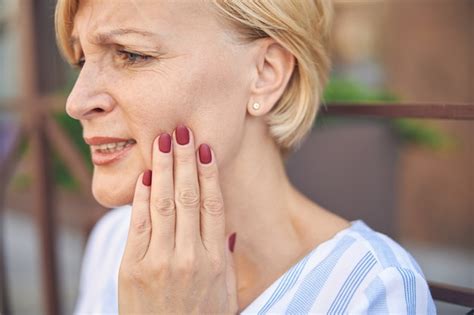 Premium Photo Close Up Portrait Of A Low Spirited Blonde Mature