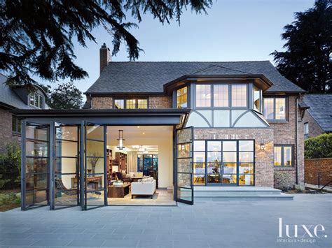 Transitional Neutral Tudor Exterior With Steel Windows Tudor Style