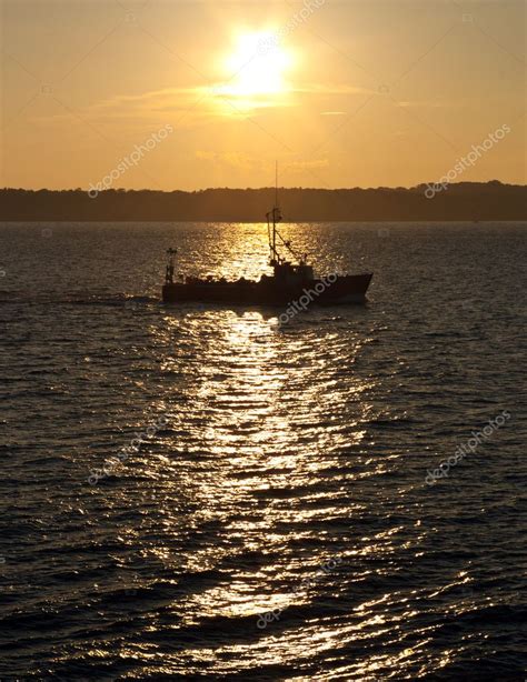 Commercial Fishing Boat At Sunset Stock Photo Psnoonan 3449061