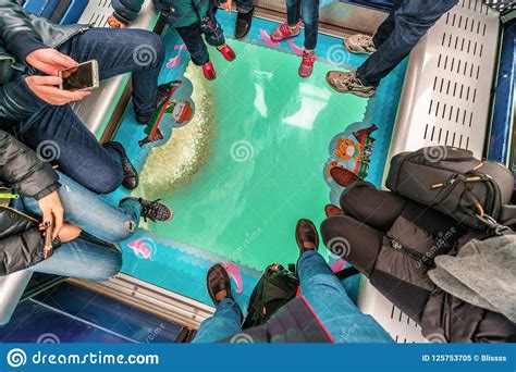 View Thru Glass Floor Of Crystal Cabin Full Of People Ngong Ping Skyrail On Lantau Island Hong