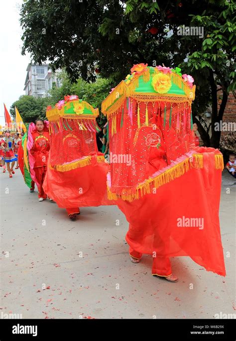 Chinese people of Miao ethnic group take part in the Firecracker Festival (Huapao Festival) in ...