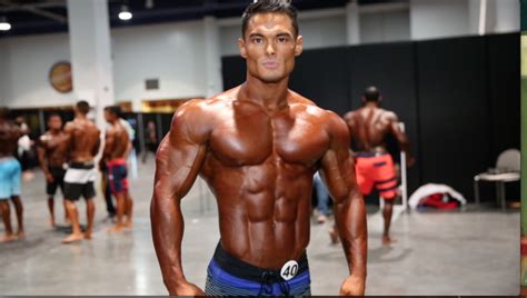 Time Olympia Men S Physique Champion Jeremy Buendia Backstage Posing