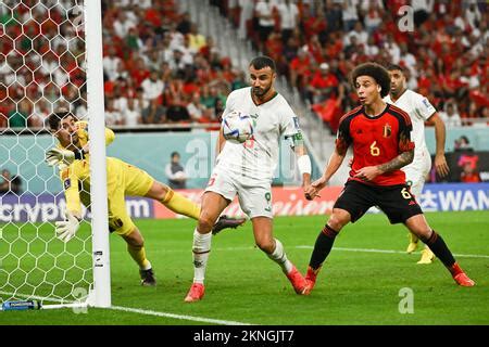 Thibaut Courtois Of Belgium And Romain Saiss Of Morocco During Belgium