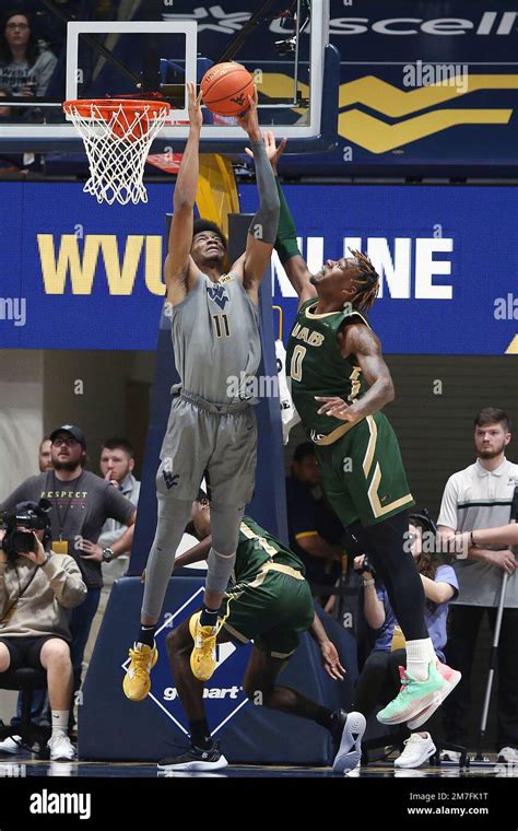 West Virginia Forward Mohamed Wague Is Defended By Uab Forward