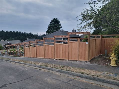 Unique custom design cedar fence - Sky Fence Company, Inc. | Top Fence ...