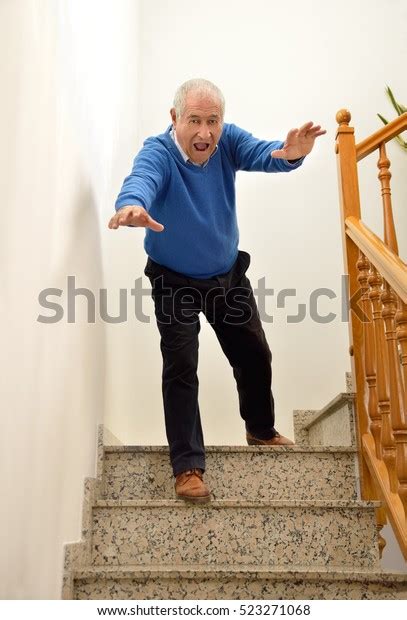 Senior Man Falling Down On Stairs Stock Photo (Edit Now) 523271068