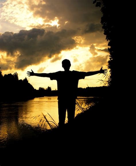 Premium Photo Silhouette Man Arms Raised Sunset Sky Landscape