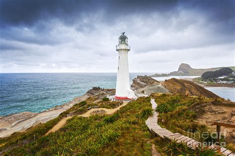 Castlepoint Lighthouse Wairarapa New Zealand Photograph By Colin And