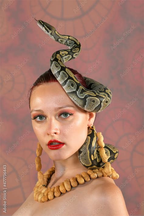 A Beautiful Woman Poses Nude For The Camera She Is Seen Wearing A