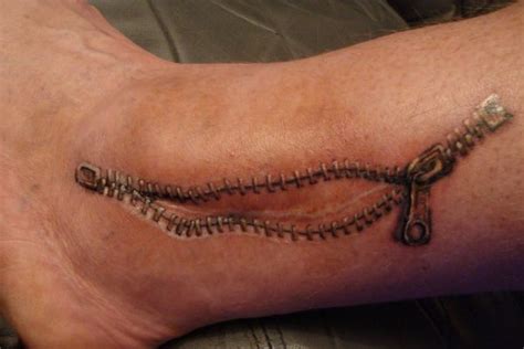 Nice Open Zipper Scar Tattoo On Ankle Tattoos Cool Tattoos