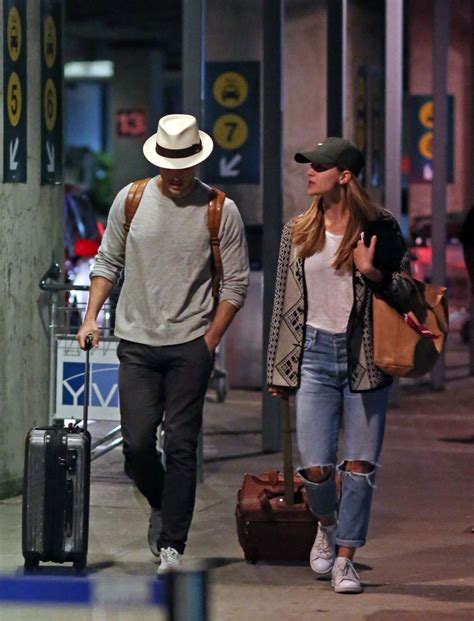 MELISSA BENOIST and Chris Wood Arriving in Vancouver 03/29/2017 ...