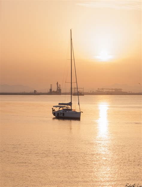 Cagliari Molo Di Levante Barchetta Al Tramonto Juzaphoto