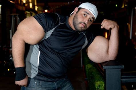 Egyptian Bodybuilder Has The Biggest Biceps In The World Pics