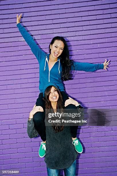 Two People Standing Shoulder To Shoulder Stock Fotos Und Bilder Getty Images