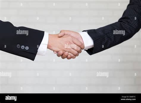 Two Businessman Shaking Hands Business Teamwork Cooperation Concept