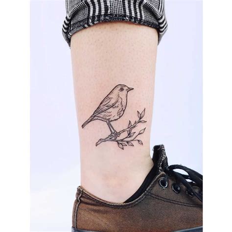 Little robin tattoo by artist Zaya - Tattoogrid.net