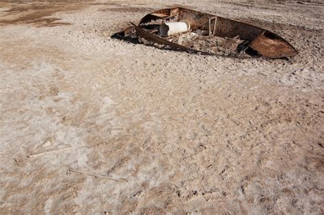 Premium Photo Old Abandoned Boat On Sandy Beach