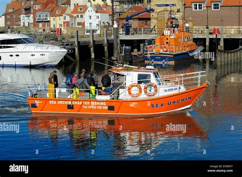 A Sea Fishing Charter Boat Arriving In Whitbynorth Yorkshireengland