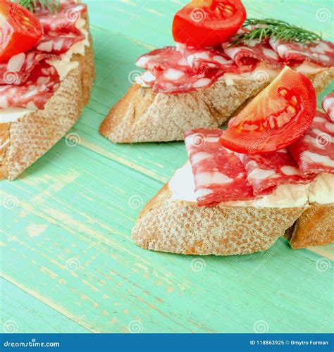 Fresh Tasty Salami Sandwiches. Appetizing Sandwiches with Smoked Stock ...