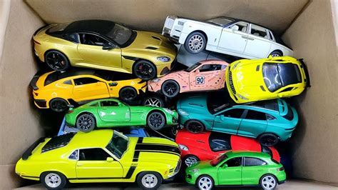 Box Full Of Model Cars Lamborghini Mclaren Lexus Lm H Porsche