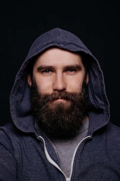 Premium Photo Handsome Male Big Beard In Hoodies Studio Shot On Black