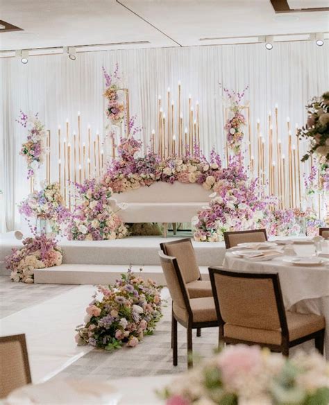 Elegant Wedding Setup With Flowers And Candles