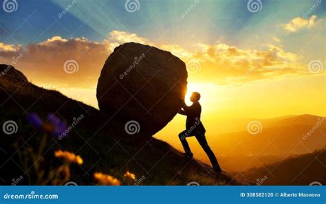 Silhouette Of Businessman Pushing Huge Stone Boulder Up On Hill