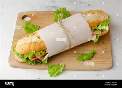 Sub Deli Sandwich Baguette With Ham Cheese Tomatoes And Lettuce Top