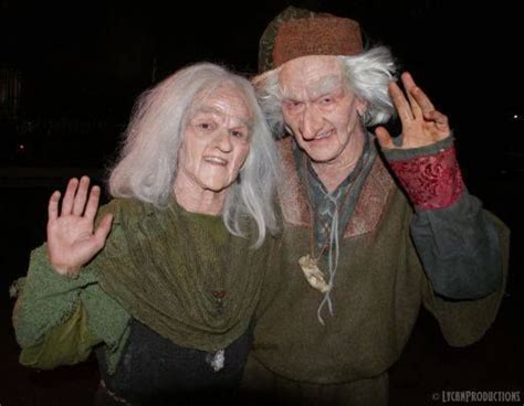 An Older Couple Dressed Up For Halloween