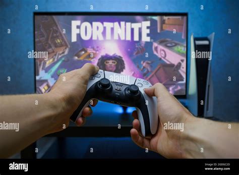 Fortnite video game on new generation Sony Playstation 5 video console. Point of view shot Stock ...