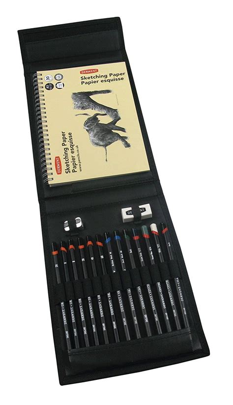 A Black Case Holds Several Pens And An Open Notebook With Two Birds On